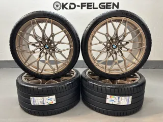 Original BMW 1000M 20/21 Zoll Sommerräder M2 G87 M3 G80 G81 M4 G82 M Performance Kreuzspeiche M 1000 Alufelgen Goldbronze matt - Bild 1