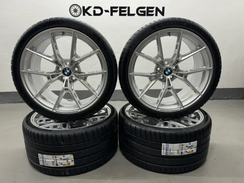 Background image for Original BMW 1063M 20/21 Zoll Sommerräder M2 G87 M3 G80 G81 M4 G82 M Performance Y-Speiche M1063 Alufelgen